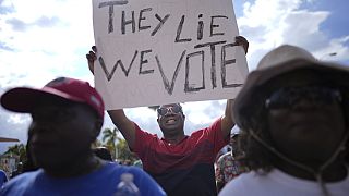 FILE - Harry J. Louis of Miami at a rally of South Florida's Haitian-American community to condemn hate speech and misinformation about Haitian immigrants,  Sept. 22, 2024